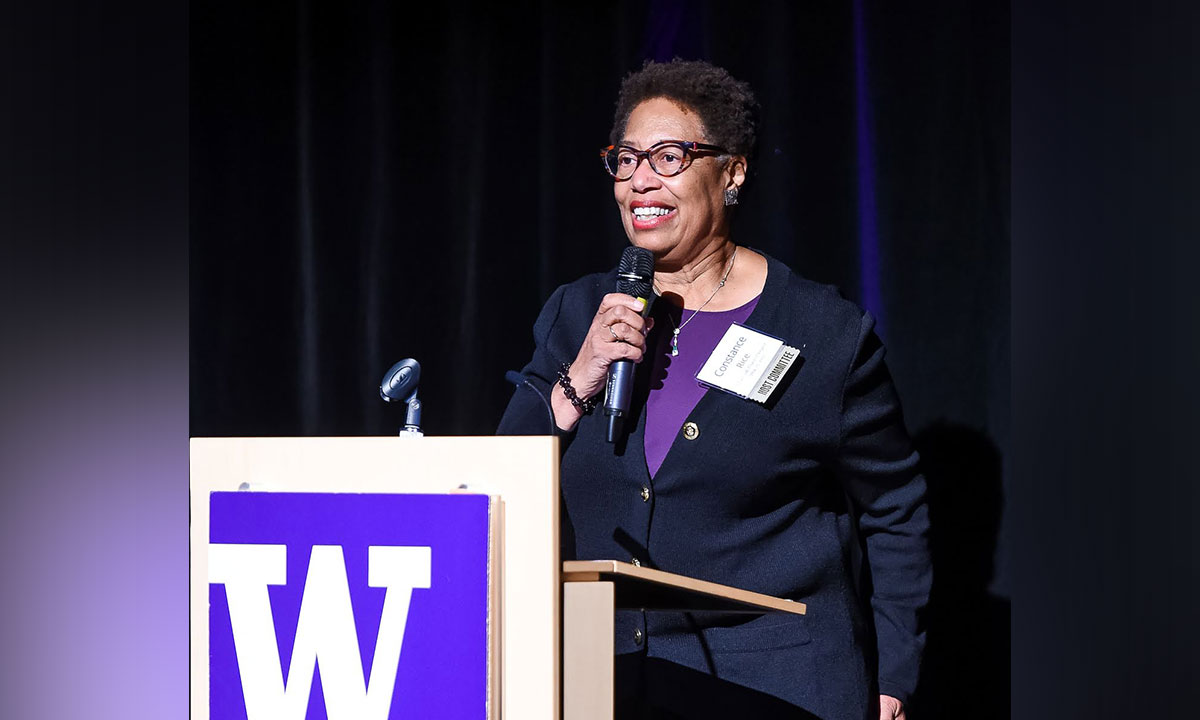 Constance Rice standing at UW podium