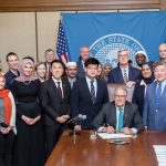 Group at Gov. Jay Inslee's signing of bill 5166