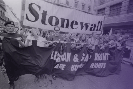 Stonewall Riots Protesters march carrying Stonewall banner