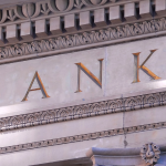 Lettering on stone bank building