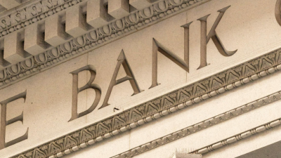 Carved bank sign on building