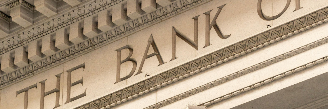 Carved bank sign on building