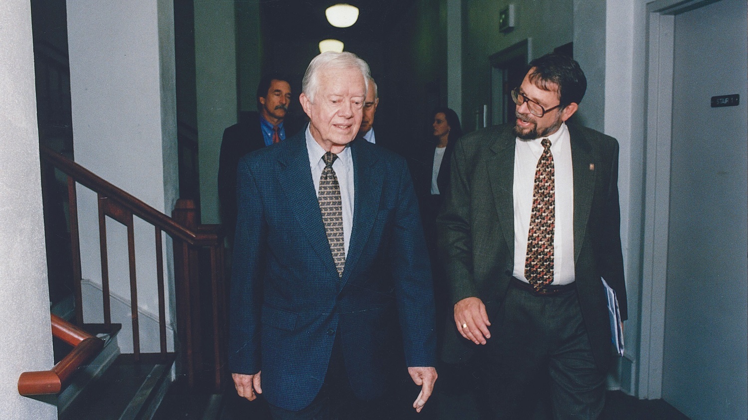 Jimmy Carter walks through Parrington Hall with Dean Marc Lindenberg