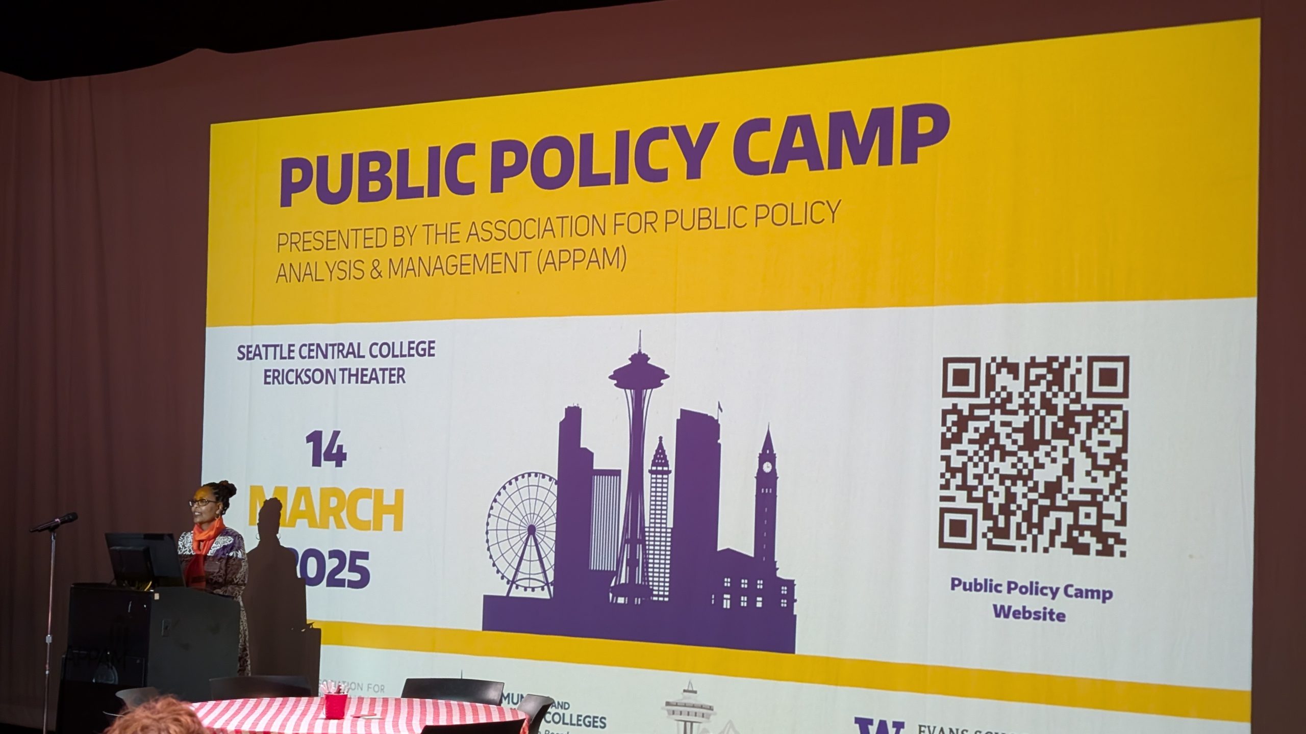 Program manager Amen Tsegai addressing room at Public Policy Camp