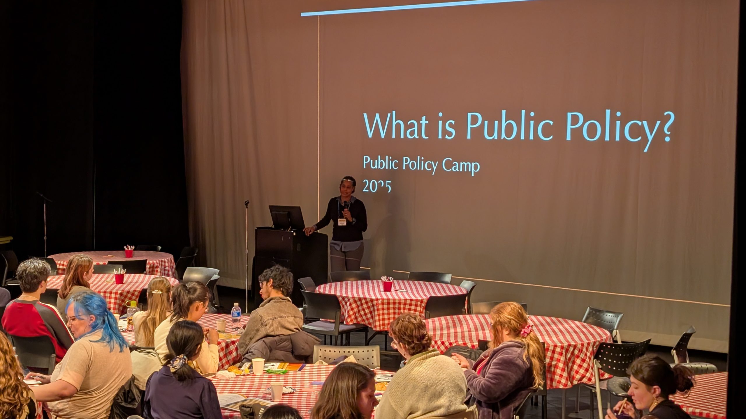 Evans faculty member Karin Martin introducing the question what is Public Policy