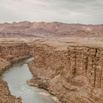 Colorado River cutting through rocky, desert area