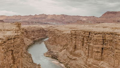Colorado River cutting through rocky, desert area