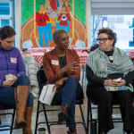 Crystal Hall leads conversation in a circle