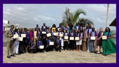 Photo of Cohort 8 Fellows holding certificate