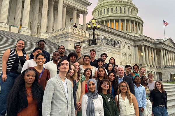 Summer Policy Academy students stand on U.S. Capitol steps